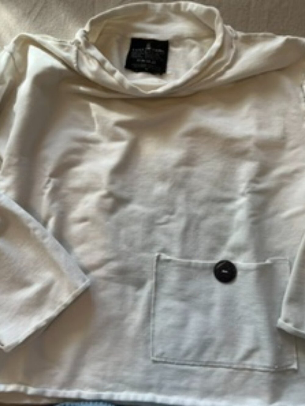 Sweatshirt with inside out styling